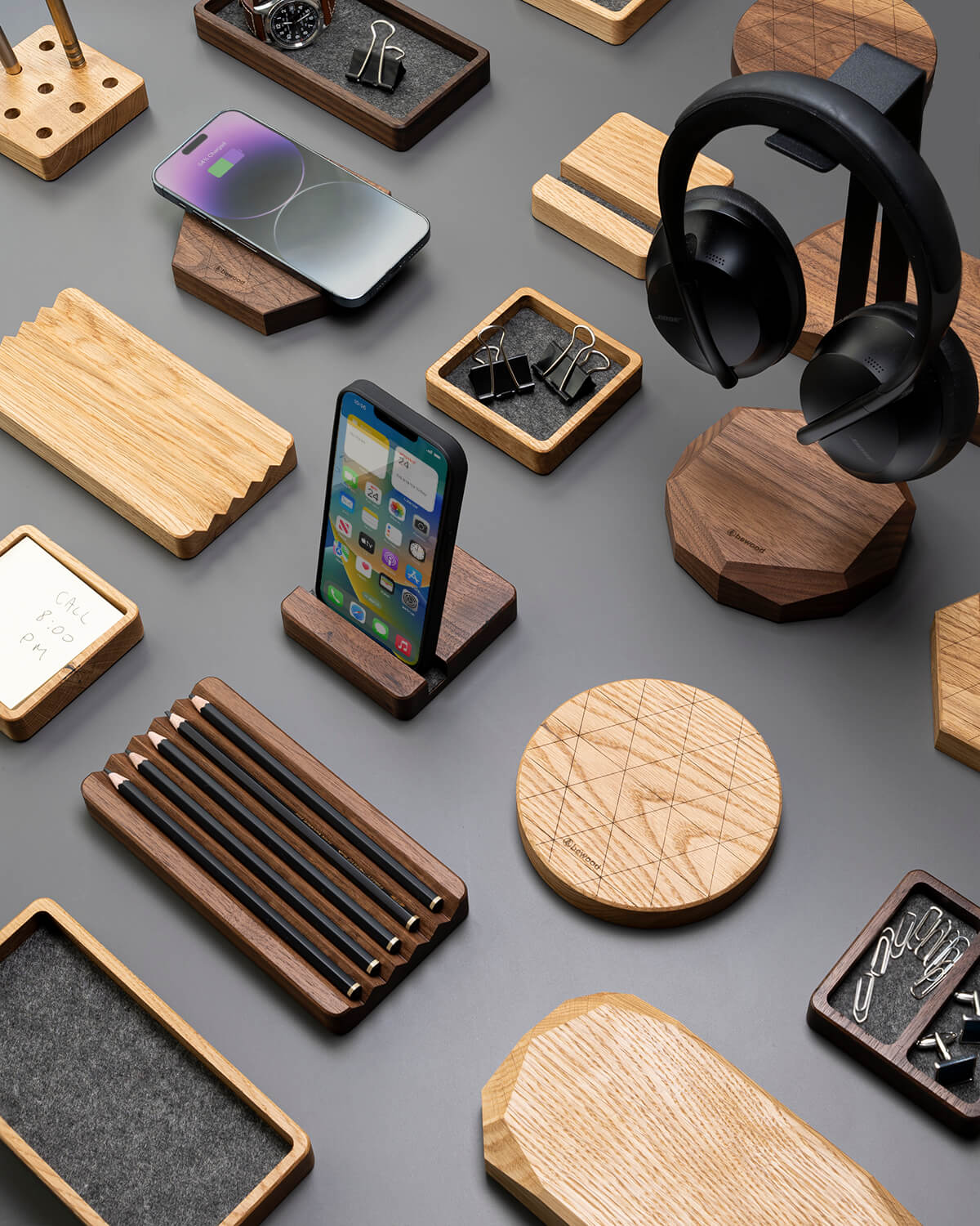 wooden desk organisers, induction chargers, headphone racks, bins